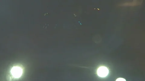 Driving in the rain in LA, looking up into the rain. 動画素材 99606322