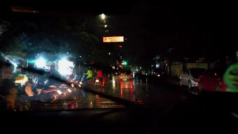 Driving In The Rain At Night. Car Interior Traveling A Rainy Dark City Stock Footage 261383536