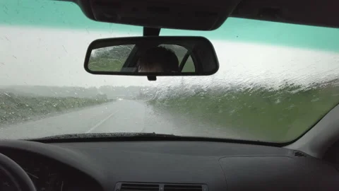 Driving in rain storm weather for compare special coat Video stock 163617287
