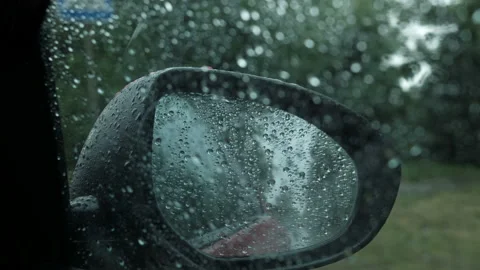 Driving in rain. View from car window with drops. Stock-Footage 94188036