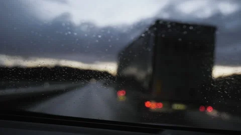 Driving In Rain - Windshield Wipers Wiping Windscreen - Dark Evening Traffic Stock Footage 161960944