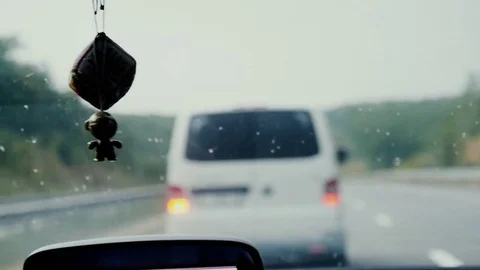 Driving in the rain with wipers Stock Footage 82696085