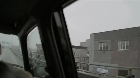 Driving rainy highway raining windshield wipers Brooklyn buildings NYC Video stock 51365076