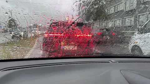 Driving in rainy weather seen from the inside of a car. 動画素材 320972415