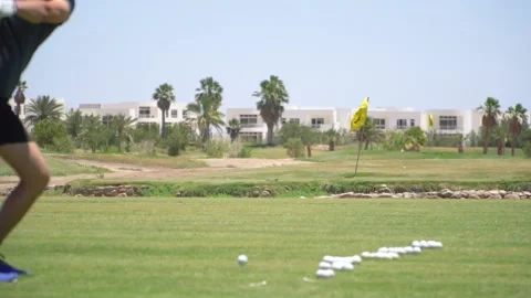 Driving Range Golf. Man practicing with golf club. Slow motion Video stock 194577870