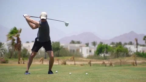 Driving Range Golf. Man practicing with golf club. Slow motion Video stock 194579734