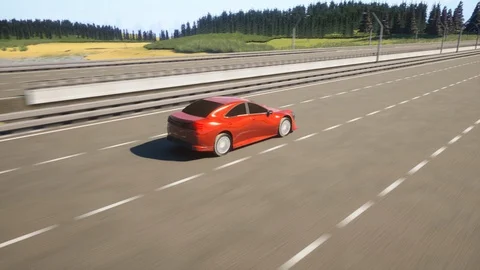 The driving of the red car across the river on the bridge Stock Footage 129242013