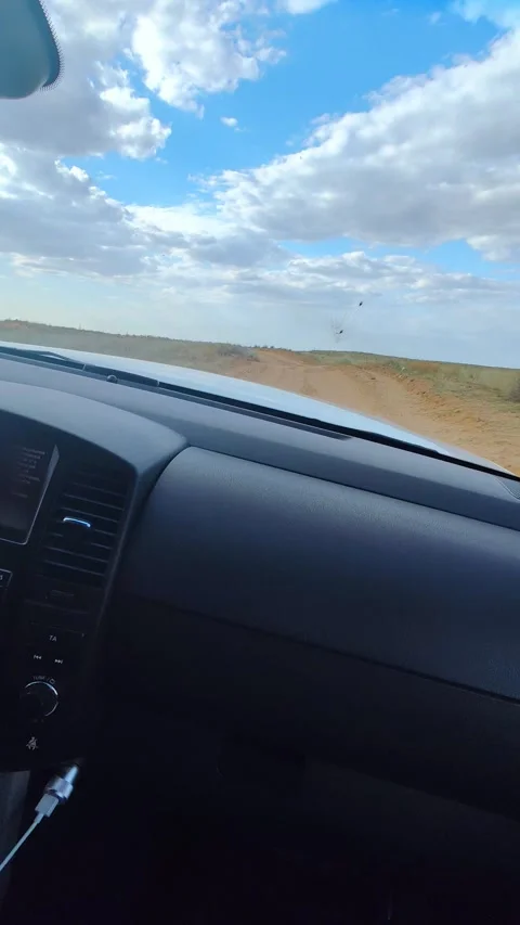 Driving off-road across the steppe by car. 動画素材 282773183