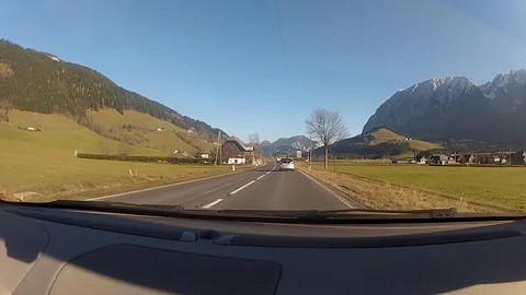 Driving on a road in the austrian alps Stock Footage 127040440