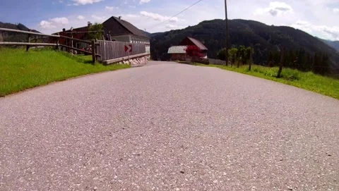 Driving on a road in the austrian alps Stock Footage 135367117