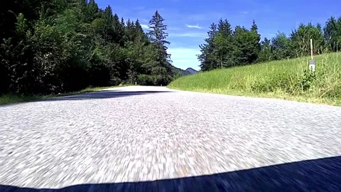 Driving on a road in the austrian alps Stock Footage 135367148