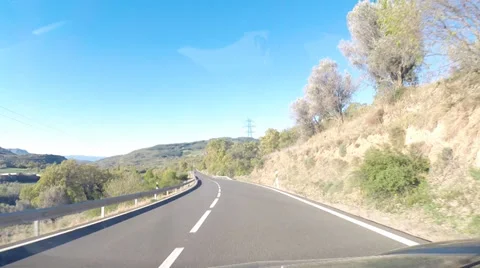 Driving on a road between nature Stock Footage 37501258