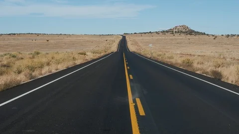 Driving On Road With Black Asphalt And Yellow Line In Usa Desert View From Car Stock Footage