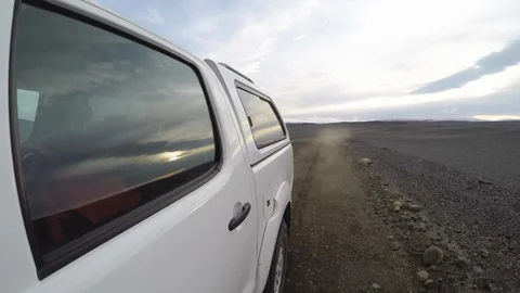 Driving off road, camera out the window looking back Stock Footage 91221235