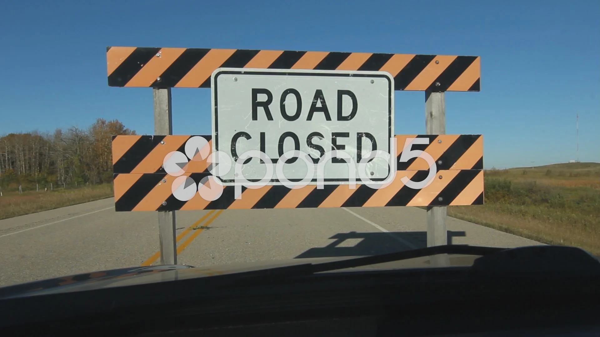 Driving up to ROAD CLOSED sign