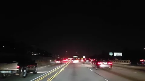 Driving on a road interstate 405 at night time, in Los angeles, California,.. Stock Footage 72760872