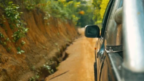 Driving off-road in the jungle in slowmo Stock Footage 94589037