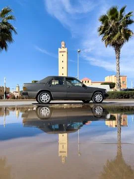 Driving on the road with a mosque in the background Stock Photos