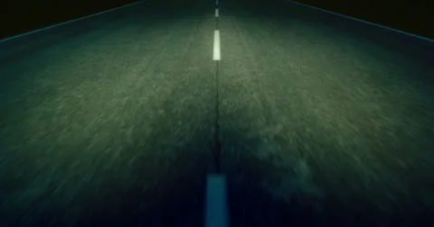 Driving on a Road at night Seamless Loop Stockbeeldmateriaal 39929105