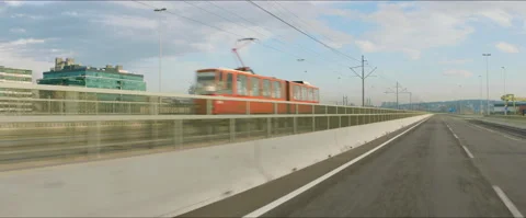 Driving on road, passing tram Stock Footage 147159032