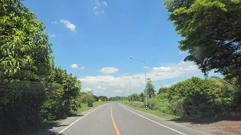 Driving on the road in rural. Stockbeeldmateriaal 340240110