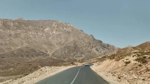 Driving Road through Kohrang Mountains Stock Footage 317858347