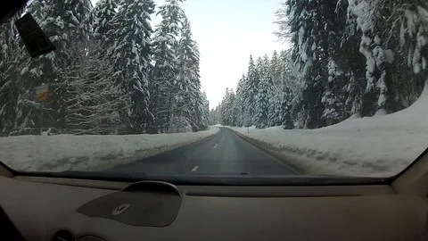 Driving on a road in winter Stock Footage 127019647