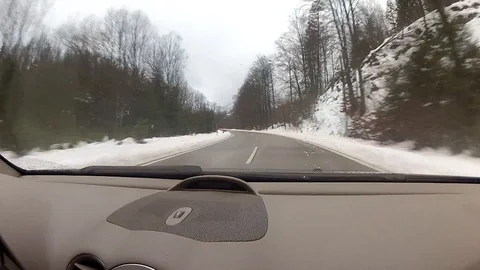 Driving on a road in winter Vídeos de archivo 127020245