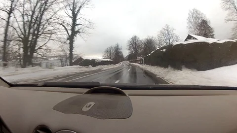 Driving on a road in winter Stock Footage 127020353