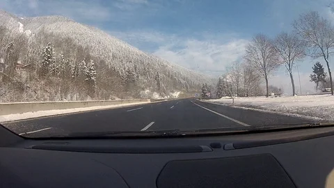 Driving on a road in winter Видео 127040176