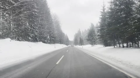 Driving on a road in winter Stock Footage 294184556