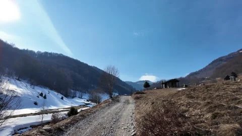 Driving on a rocky road with a mountains. Stock Footage 317680766