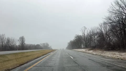 Driving on a rural highway in winter Stock Footage 304620682