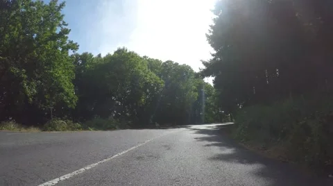 Driving on a rural road in a forest Video stock 58723227