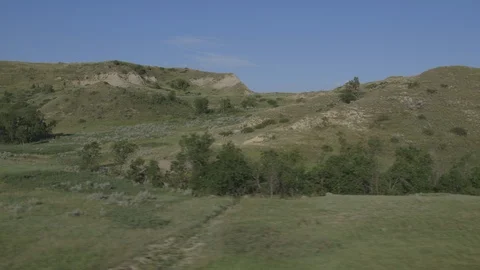 Driving Scenic Loop in Theodore Roosevelt National Park Landscape Stock Footage 121639287