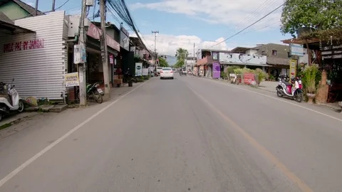 Driving Scooter Down Road in Pai Thailand Stock Footage 85083141
