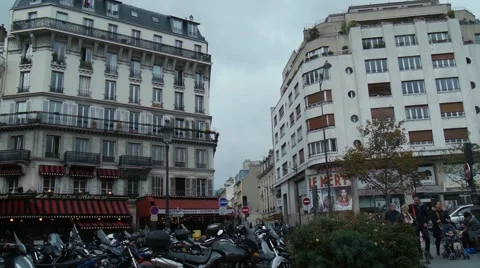 Driving Shot looking down Rue Biot at Place de Clichy in Paris Stock Footage 59738384