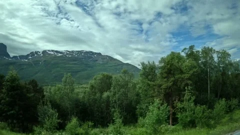 Driving side window view of Northern Lights Route sign and fjord in Norway Stock-Footage 340960141