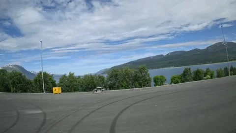 Driving side window view of roadside rest stop fjord in Northern Norway Stock-Footage 340960146
