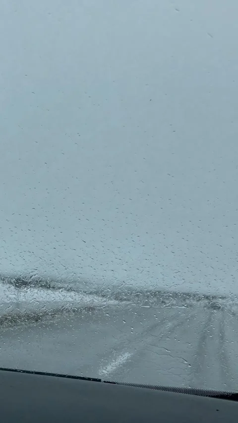 Driving on Snow Covered Road During Winter Storm – View from Car Stock Footage 328684343