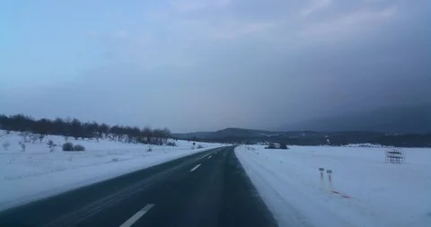 Driving in the snow Stock Footage 125649227