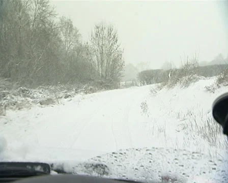 Driving in snow POV Stock Footage 32542250