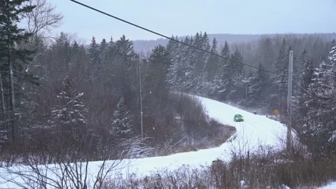 Driving in a snow storm Stock Footage 166701286