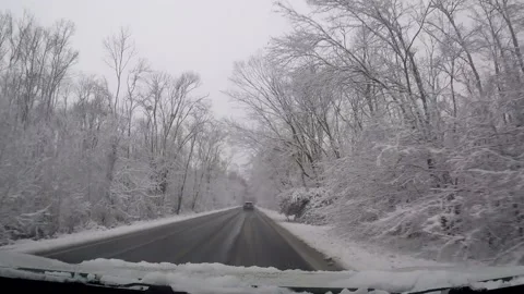 Driving in the snow windshield view, Stock Footage 229356609