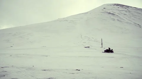 Driving snowmobile through the arctic winter landscape in Svalbard. Stock-Footage 208955087