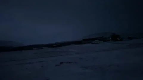 Driving in a snowy dark night Stock Footage 237970704