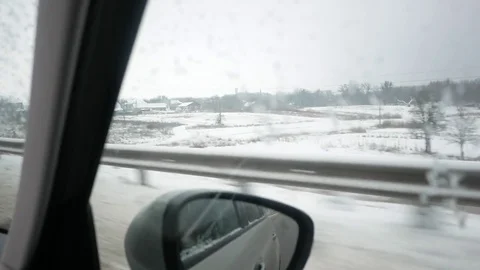 Driving on a snowy highway Video stock 72715640