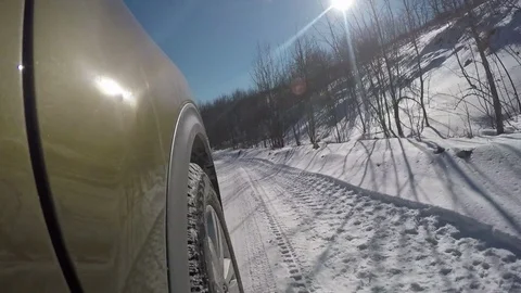 Driving on snowy off road Stock Footage 72044677
