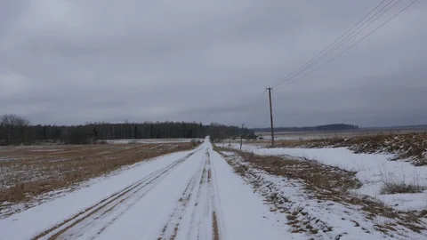 Driving in snowy road Stock Footage 95728165