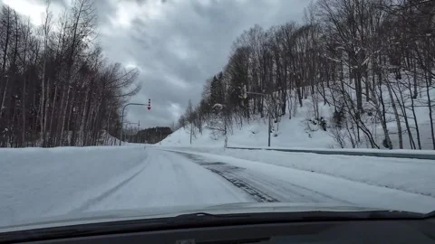 Driving Snowy Valley Road Between Slopes Hokkaido Japan Winter Видео 333370423